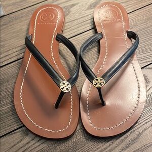 Tory Burch Black and Brown Sandals with Gold Medallion